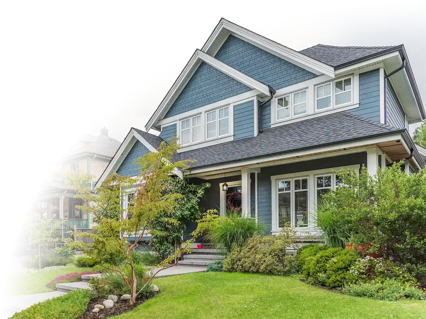 Blue home with lawn